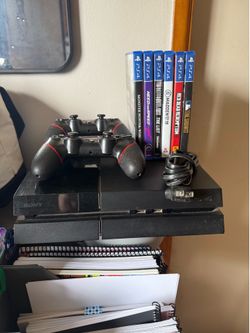 Sony PS4 with controllers and games
