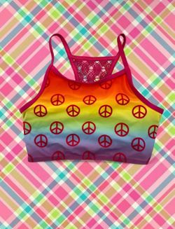 Rainbow peace sign bikini top with red peace symbols on a gradient background #peace #rainbow