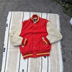 vintage Holloway varsity jacket with red wool body and white leather sleeves. 