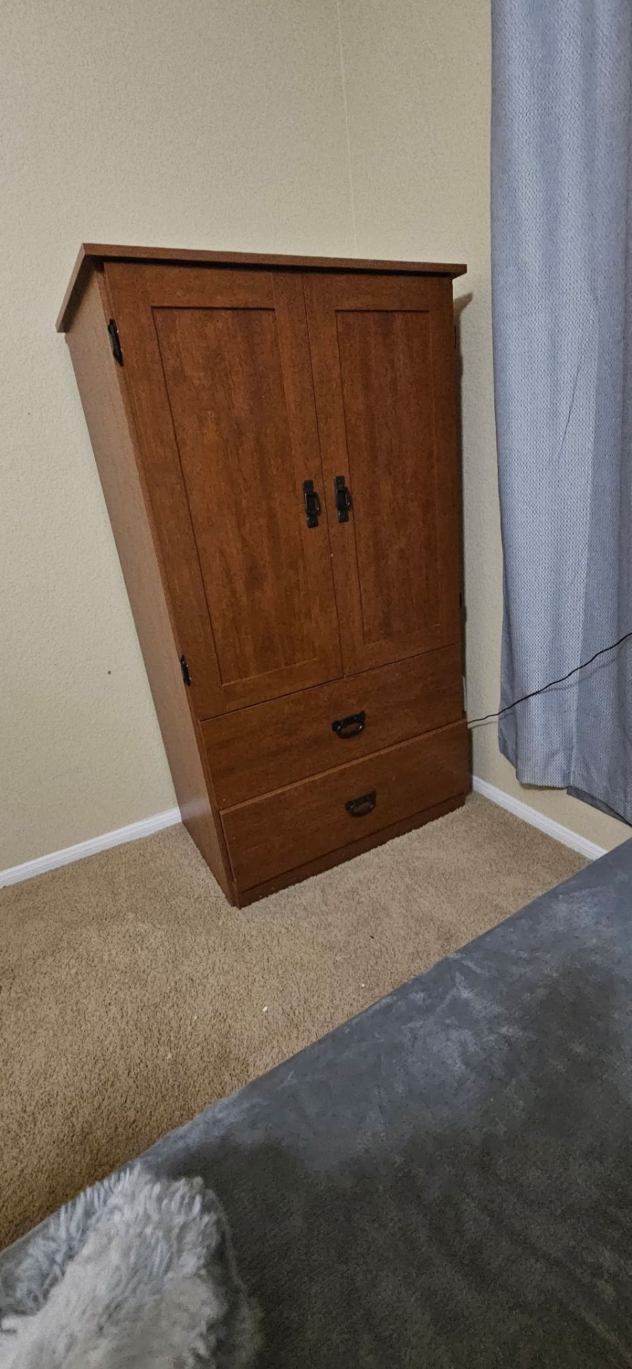Armoire with shelves and drawers