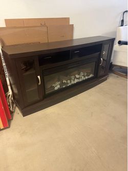 Media console table with fireplace
