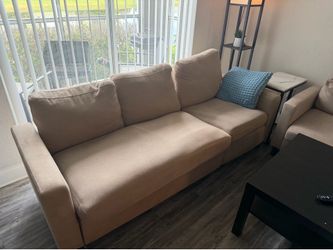 2  sofas, coffee table , mirror and Christmas tree