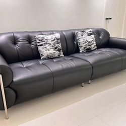 Mid-Century Modern Black Cowhide Leather Tufted Sofa with Chrome Legs