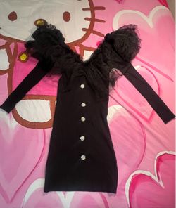 The black sweater dress is very stretchy.