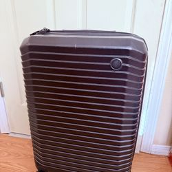 Checked Luggage Medium
