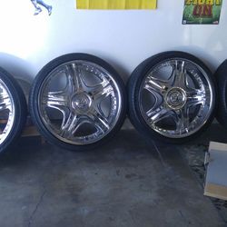 26 inch Chrome rims and tires