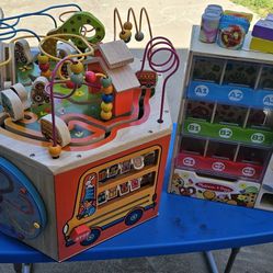 B. Toys wooden activity cube and Melissa & Doug vending machine