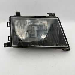 97 to 99 Mitsubishi Montero OEM Right Passenger Side Headlight Lamp