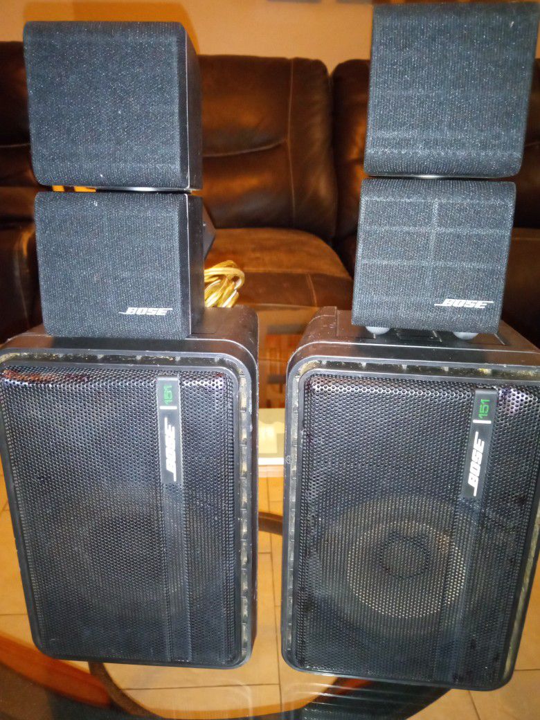 2  Bose Model 101 Speakers And 2 Cube Bose Speakers