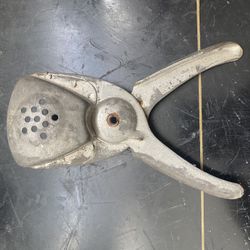 Vintage aluminum lemon hand squeezer