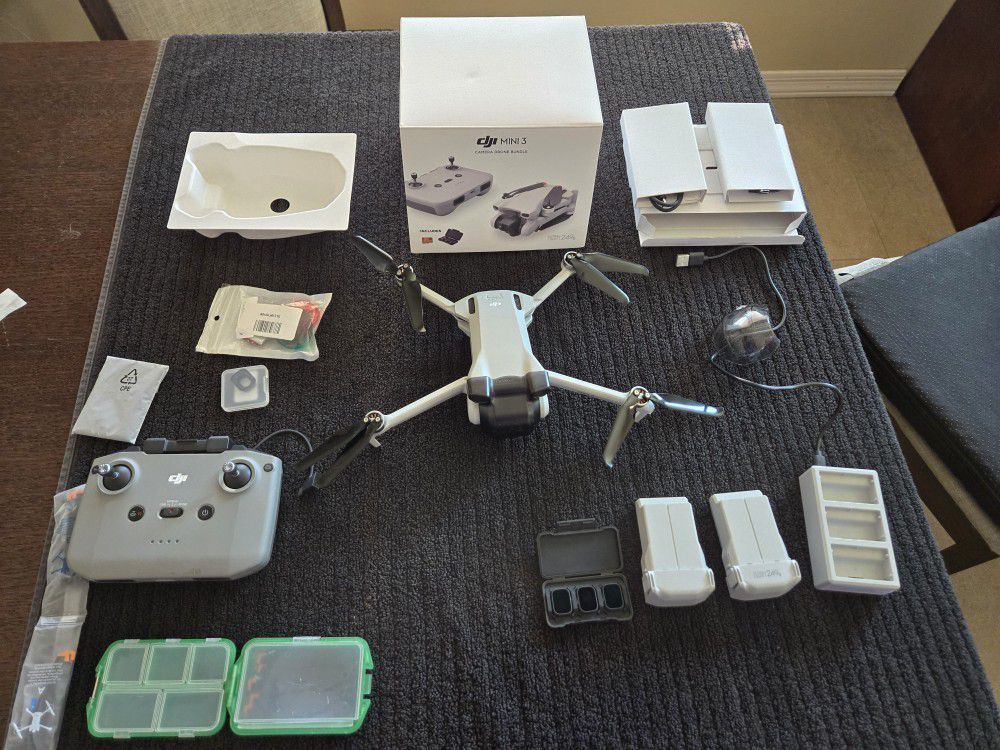 DJI Mini 3 Drone like new in box , 2 batteries and charger , case