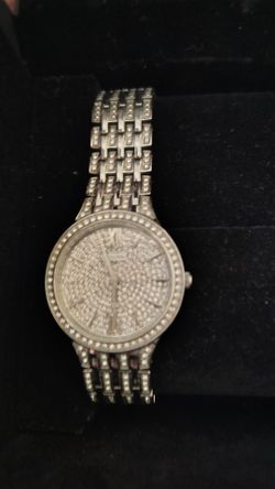 Men's Bulova watch ,, silver color,needs batteries