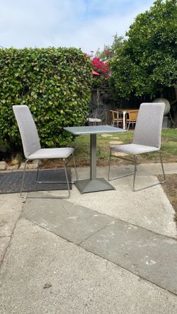 Three pieces Dining set space saver, perfect small places small balconies good condition clean comfortable chairs Table’s size H28.5” L24” W 24”