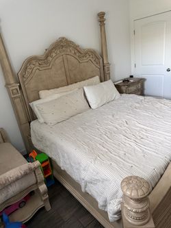 Bed from Ashley including mirror and dressing table ,side table and setts