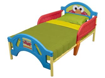 Barely used Elmo toddler bed w/ mattress