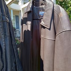 2 Leather Jackets. One Man's Fleece Lined Hoodie Type. The Other Is Woman's All Leather. Both Are A Size Large