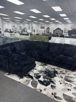 June Promotion Elevate your living space with this Black Luxurious black sectional