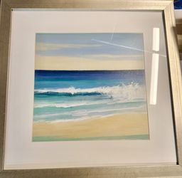 A Set Of Hanging Photos 