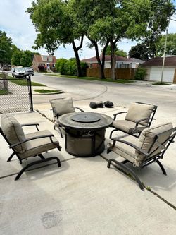 Propane firepit patio set, “ Firepit needs work,4 bouncy chairs with thick comfortable cushions