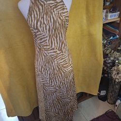 Banana Republic cross back slip dress size small. Excellent condition Brown and beige wavy stripes.. clean no damage. Worn once. Ready to go with flat
