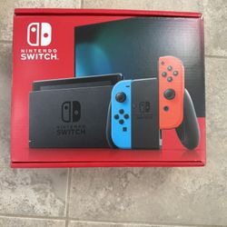 Nintendo Switch with Neon Blue and Neon Red Joy-Con