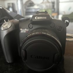 Canon PowerShot SX10 IS with 20x zoom lens.