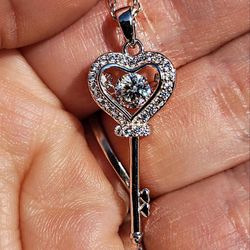 0.5 Carat Moissanite 18kt white gold plated Sterling Silver Key Necklace