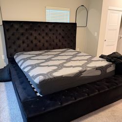 Tufted black king size bed