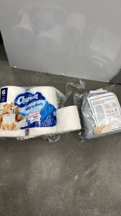 Toilet paper and an ironing board cover