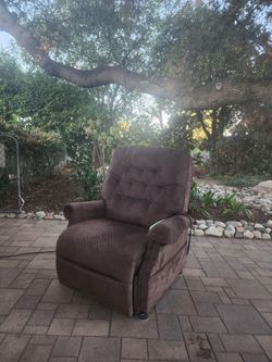 Large automatic recliner" stands up"