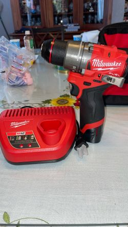 New Milwaukee Fuel M12 Hammer Drill W/ Battery 2.0ah And Charger - Pick Up Only 