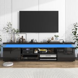 LED T V Stan d for 85 Inch T V, Modern T V Stan d with Power Outlet, High Gloss T V Consol e Entertainment Cente r with Storage and LED Lights 