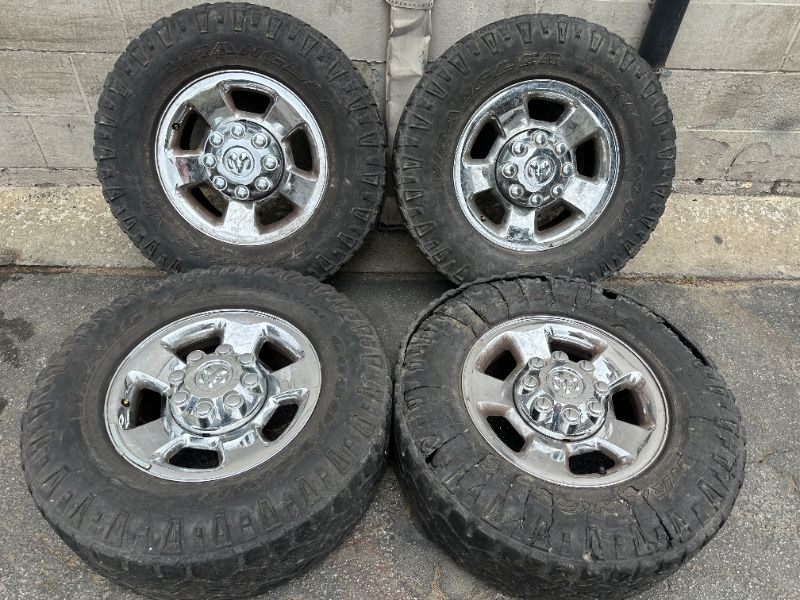 3rd gen Dodge Ram chrome aluminum 17 inch rims caps and old tire 8 lug - T08741