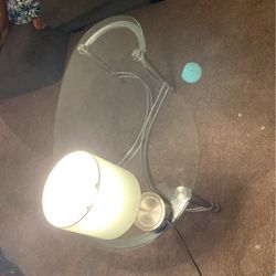 Glass table with silver Leg