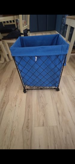 Blue laundry hamper.
