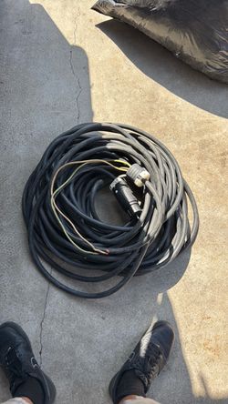 130 feet of 8-3 SO cord.