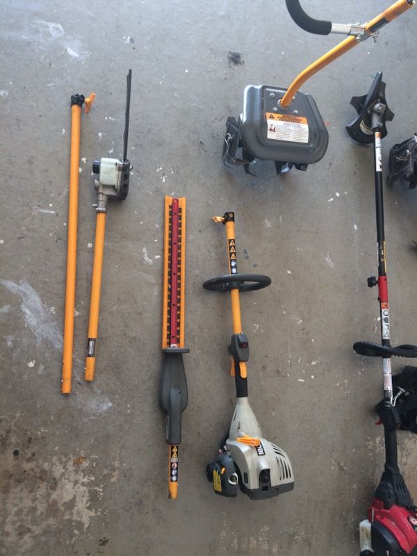 Ryobi EX26 Expandit with pole saw, hedge trimmer, tiller, brush cutter