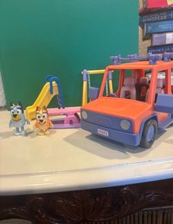 bluey car and playground toys with bluey and bingo figures