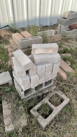 Used bricks, cinder blocks, and concrete pavers
