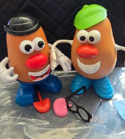 Two Mr Potato Head Toys