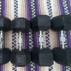 PAIR OF  (30 LB. = $90  &  40 LB.  = $120) RUBBER DUMBBELLS 
 *******will sell the 30s or 40s separately 