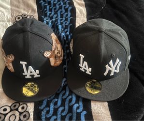 2 hats both fitted size both are size 7 1/2  selling both for 60.00