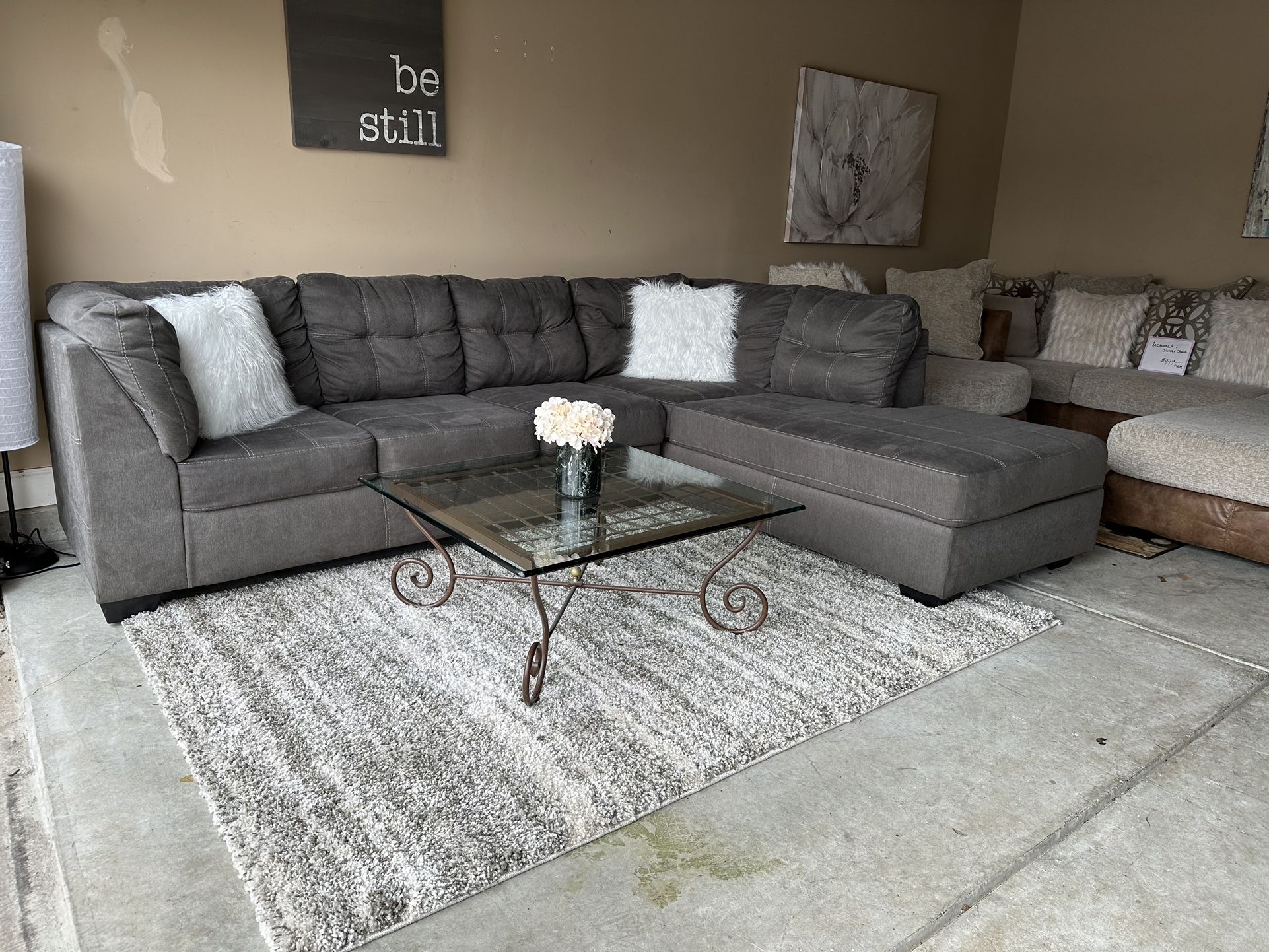 Beautiful, gray, two-piece Ashley furniture sectional