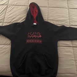 Women hoodie with the word Palestinian(فلسطينية)