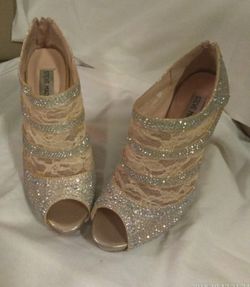 Size 7.5 Steve Madden pink and silver 5 in heels