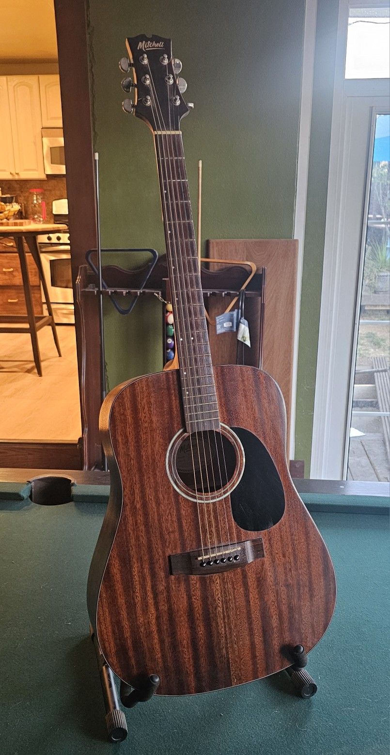 Guitar with soft padded case.