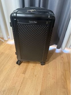 Black Calvin Klein luggage
