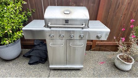 Four burner Kenmore propane grill
