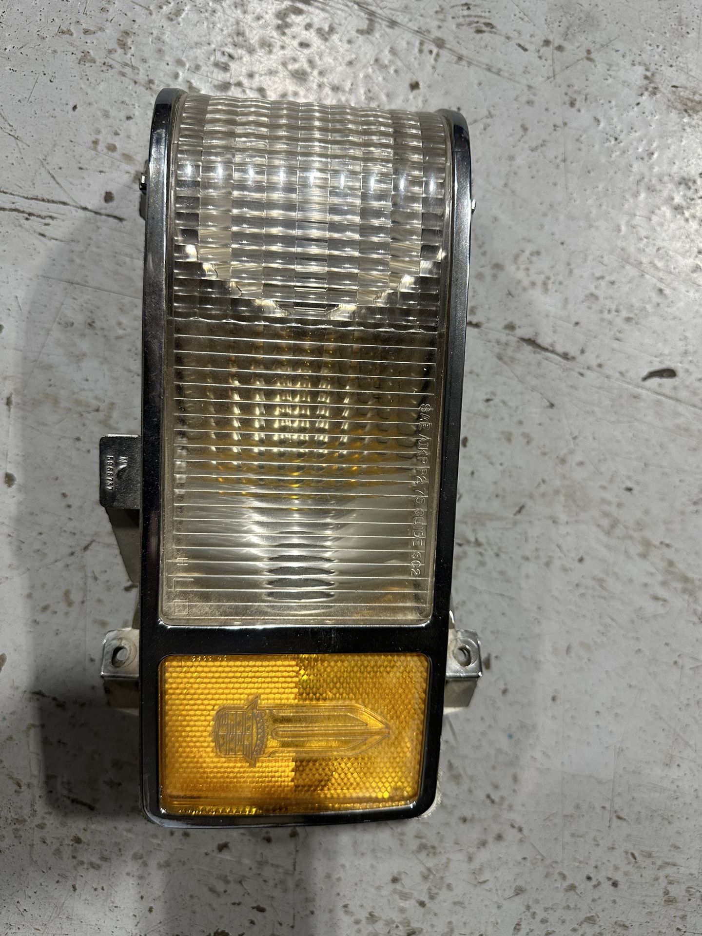 Cadillac LH Turn Signal Housing with Chrome Bezel