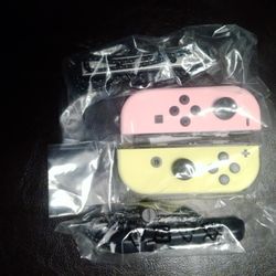 1 Set Of Nintendo Switch Joy Cons/ 1 Wireless Horipad Controller